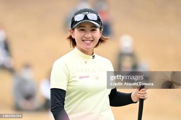 Kana Nagai of Japan reacts after holing out with the birdie on the 18th green during the final round of the Meiji Yasuda Life Ladies Yokohama Tire...
