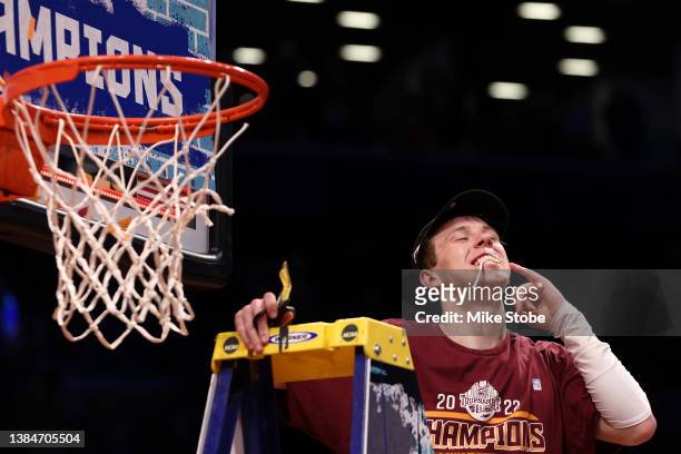 Storm Murphy of the Virginia Tech Hokies celebrates after defeating the Duke Blue Devils to win the 2022 Men's ACC Basketball Tournament -...