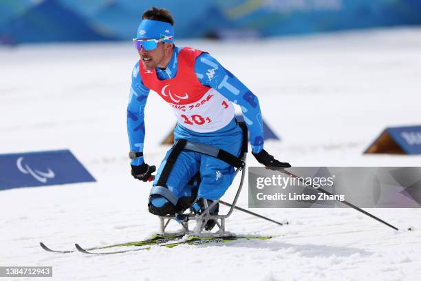 Michele Biglione of Team Italy competes in the Para Cross-Country Open 4x2.5km Relay during day nine of the Beijing 2022 Winter Paralympics at...
