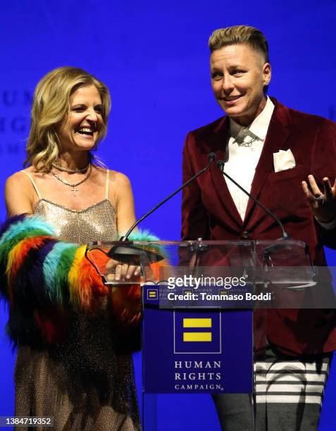 Glennon Doyle and Abby Wambach speak onstage during the Human Rights Campaign 2022 Los Angeles Dinner at JW Marriott Los Angeles L.A. LIVE on March...