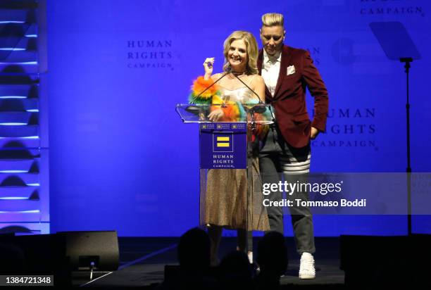 Glennon Doyle and Abby Wambach speak onstage during the Human Rights Campaign 2022 Los Angeles Dinner at JW Marriott Los Angeles L.A. LIVE on March...