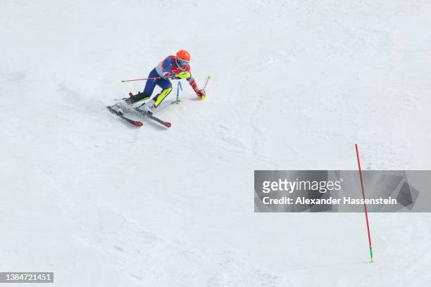 Arthur Bauchet of Team France competes in the Para Alpine Skiing Men's Slalom Standing during day nine of the Beijing 2022 Winter Paralympics at...