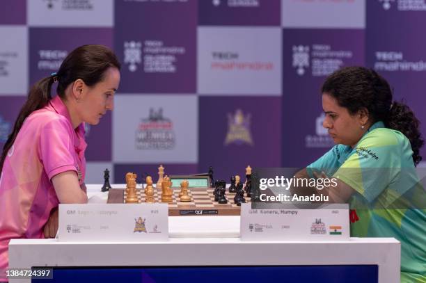 Kateryna Lango of Russia from Triveni Continental Kings team competes with Koneru Humpy of India from upGrad Mumba Masters team during final matches...