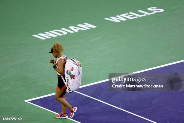 Naomi Osaka of Japan walks off the court after losing to Veronika Kudermetova of Russia during the BNP Paribas Open at the Indian Wells Tennis Garden...
