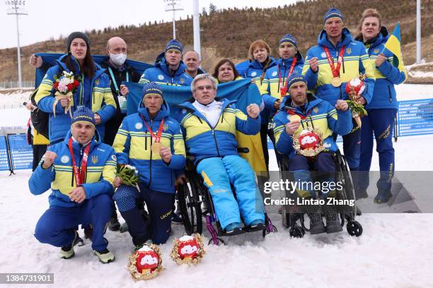 Team Ukraine pose with their gold medals following the Para Cross-Country Open 4x2.5km Relay during day nine of the Beijing 2022 Winter Paralympics...