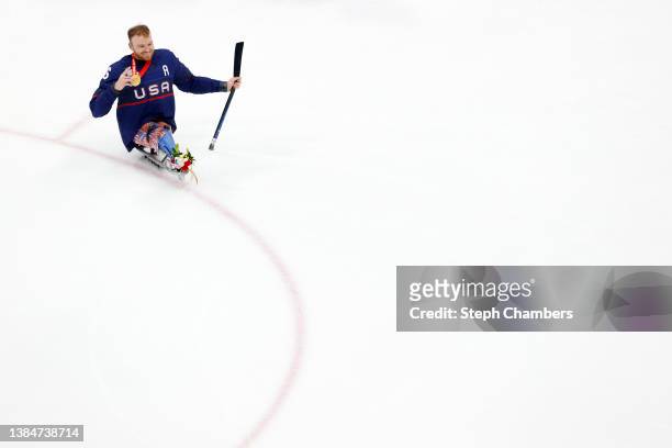 Gold medal winner Declan Farmer of Team United States celebrates during the Para Ice Hockey medal ceremony after the Gold Medal game on day nine of...