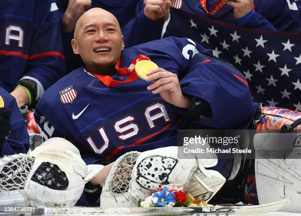 Gold medal winner Jen Lee of Team United States celebrates during the Para Ice Hockey medal ceremony after the Gold Medal game on day nine of the...