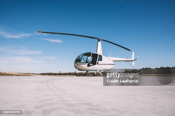 helicopter ready for departure - helicopter blades stock pictures, royalty-free photos & images