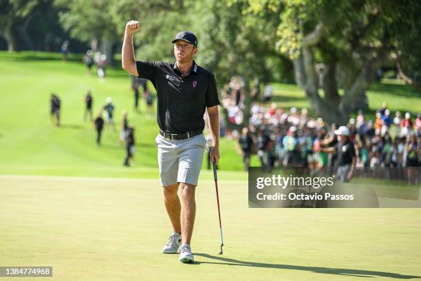 Talor Gooch of RangeGoats GC celebrates after sinking a birdie putt on the 18th hole during day three of LIV Golf - Andalucia at Real Club Valderrama...