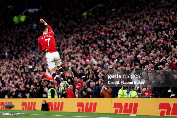 Cristiano Ronaldo of Manchester United celebrates after scoring their team's first goal during the Premier League match between Manchester United and...