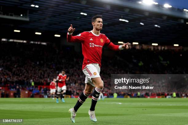 Cristiano Ronaldo of Manchester United celebrates after scoring their team's second goal during the Premier League match between Manchester United...