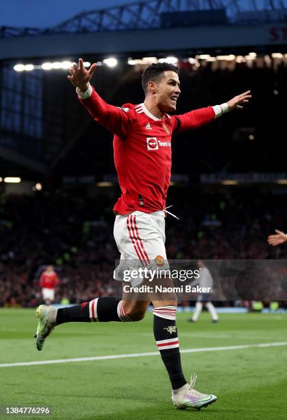 Cristiano Ronaldo of Manchester United celebrates after scoring their team's second goal during the Premier League match between Manchester United...