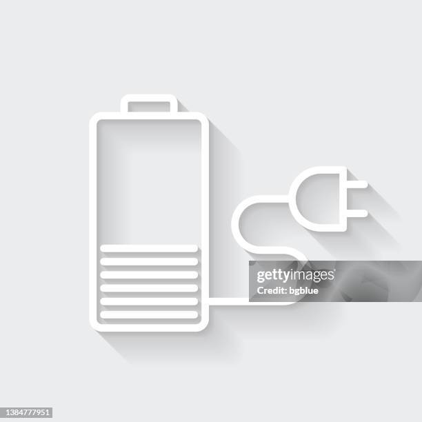 battery charging. icon with long shadow on blank background - flat design - lithium stock illustrations