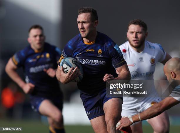 Ashley Beck of Worcester Warriors runs with the ball during the Gallagher Premiership Rugby match between Worcester Warriors and Exeter Chiefs at...