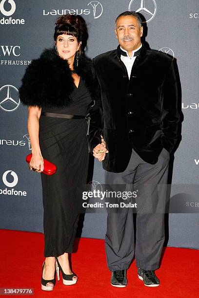 Academy member Daley Thompson and Kerry Reid attend the 2012 Laureus World Sports Awards at Central Hall Westminster on February 6, 2012 in London,...