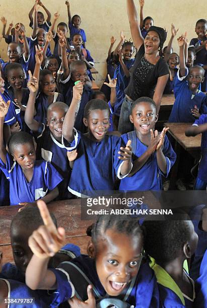 School children pose for the photographer on February 7, 2012 in Bata, one of the four cities hosting matches of the 2012 Africa Cup of Nations...