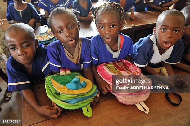 School children pose for the photographer on February 7, 2012 in Bata, one of the four cities hosting matches of the 2012 Africa Cup of Nations...