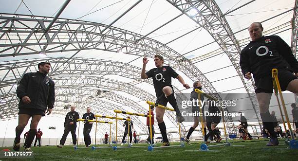 Toby Flood warms up during the England training session held at the Soccer Dome on February 7, 2012 in Greenwich, England.