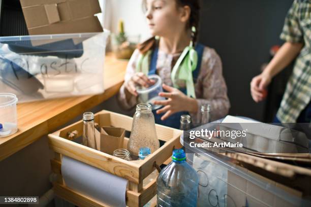 To Sort Out 394 Girl Sorting Recycling Stock Photos, High-Res Pictures, and Images ...