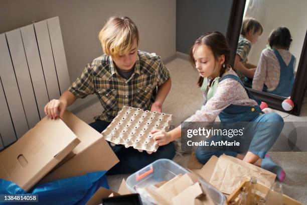 To Sort Out 389 Girl Sorting Recycling Stock Photos, High-Res Pictures, and Images ...
