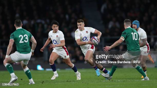 Henry Slade of England runs with the ball during the Guinness Six Nations Rugby match between England and Ireland at Twickenham Stadium on March 12,...