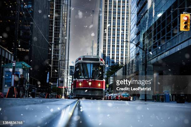new modern tram in toronto - toronto winter stock pictures, royalty-free photos & images