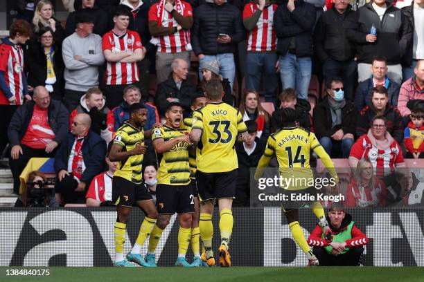 Cucho Hernandez of Watford FC celebrates with team mates after scoring their sides first goal during the Premier League match between Southampton and...