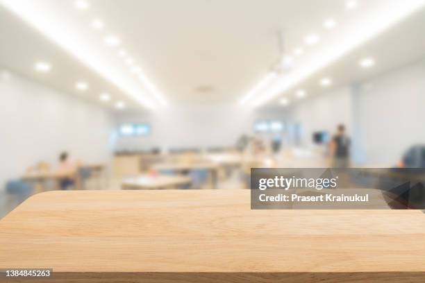 empty wood table top, counter in foodcourt - shopping montage stock pictures, royalty-free photos & images