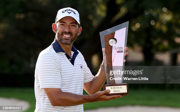 Pablo Larrazabal of Spain celebrates with the winners trophy after his victory on the second play-off hole during the final round of the MyGolfLife...