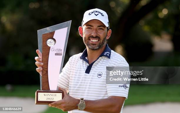 Pablo Larrazabal of Spain celebrates with the winners trophy after his victory on the second play-off hole during the final round of the MyGolfLife...