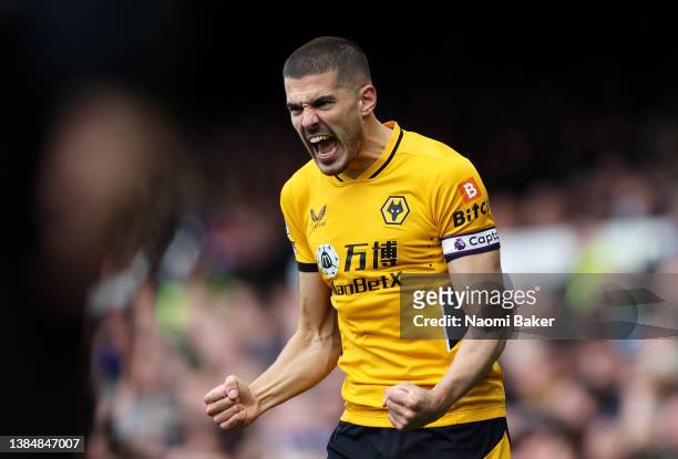 Conor Coady of Wolverhampton Wanderers celebrates after scoring their side's first goal during the Premier League match between Everton and...