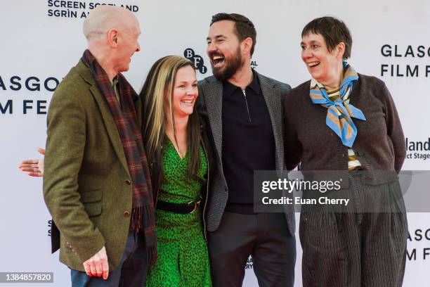 Paul Laverty, Aneemarie Fulton, Martin Compston, Rebecca O'Brien attend the 20th anniversary screening of the film "Sweet 16" on March 13, 2022 in...