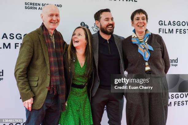 Paul Laverty, Aneemarie Fulton, Martin Compston, Rebecca O'Brien attend the 20th anniversary screening of the film "Sweet 16" on March 13, 2022 in...