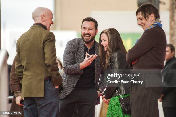 Paul Lavert, Martin Compston, Annemarie Fulton, Rebecca O'Brien attend the 20th anniversary screening of the film "Sweet 16" on March 13, 2022 in...