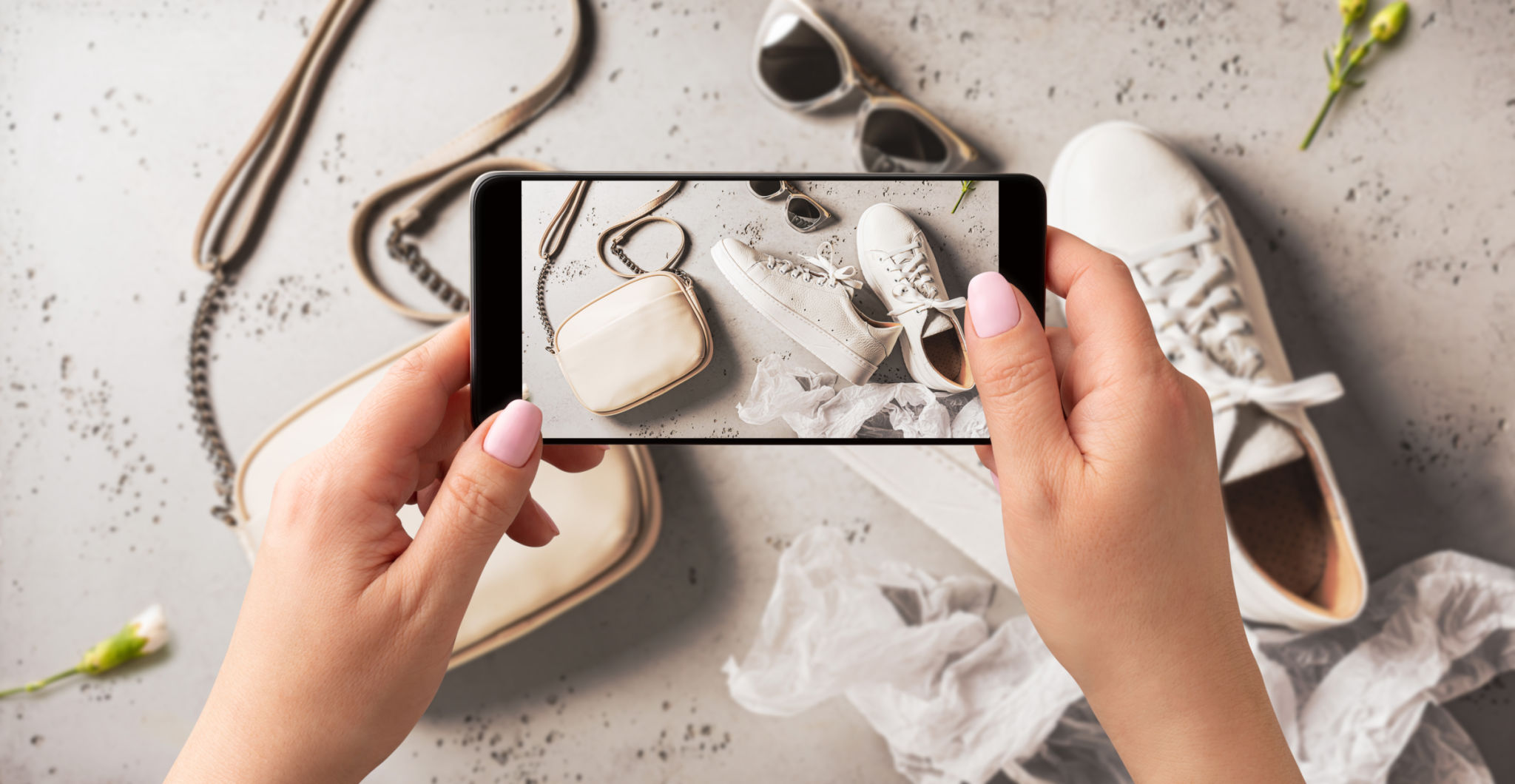Woman taking photo of spring fashion accessories with smartphone. Influencer and social media. Woman taking photo of spring fashion accessories with smartphone. Influencer and social media.