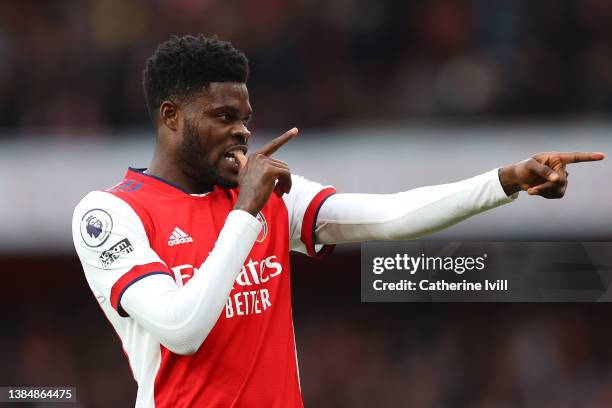 Thomas Partey of Arsenal celebrates after scoring their side's first goal during the Premier League match between Arsenal and Leicester City at...