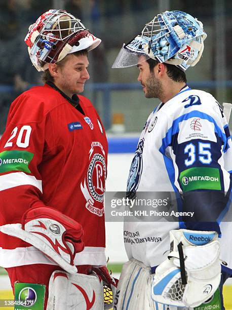 Goalkeeper Kevin Lalande of the Dinamo and goalkeeper Sergei Denisov of the Vityaz after the game between Dinamo Minsk and Vityaz Chekhov during the...