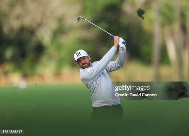 Sergio Garcia of Spain plays his second shot on the par 4, seventh hole during the weather delayed completion of the second round of THE PLAYERS...