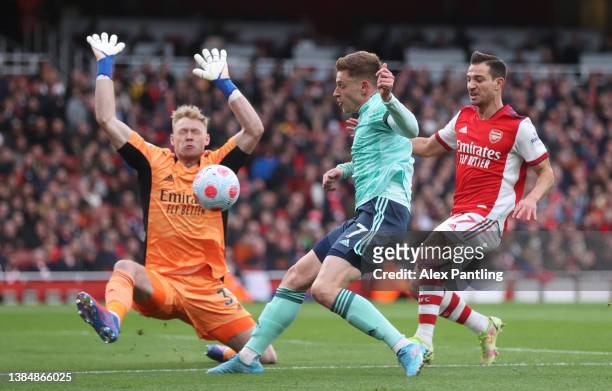 Aaron Ramsdale of Arsenal makes a save from Harvey Barnes of Leicester City during the Premier League match between Arsenal and Leicester City at...