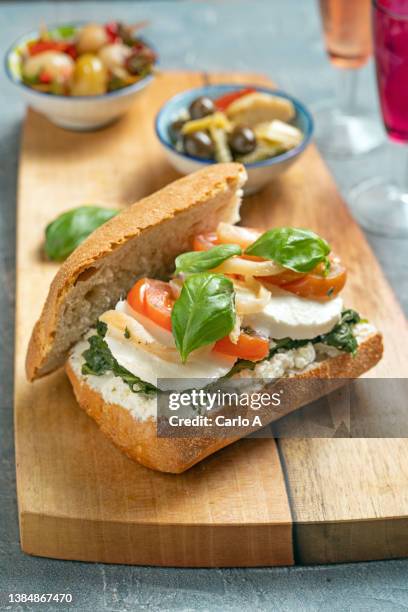 italian food caprese panini - ciabatta stock-fotos und bilder