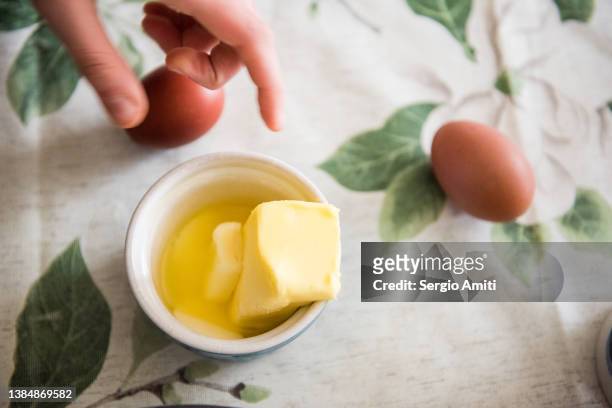 melted butter and eggs - butter tart stock pictures, royalty-free photos & images