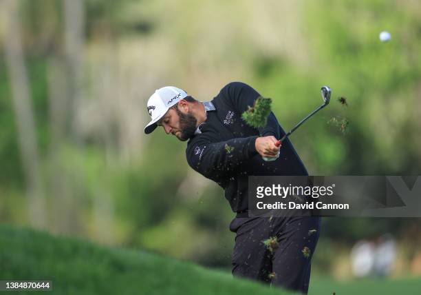 Jon Rahm of Spain plays his second shot on the par 4, seventh hole during the weather delayed completion of the second round of THE PLAYERS...