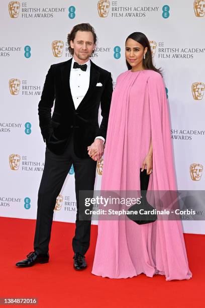 Tom Hiddleston and Zawe Ashton attend the EE British Academy Film Awards 2022 at Royal Albert Hall on March 13, 2022 in London, England.