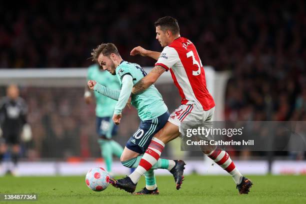 James Maddison of Leicester City is challenged by Granit Xhaka of Arsenal during the Premier League match between Arsenal and Leicester City at...