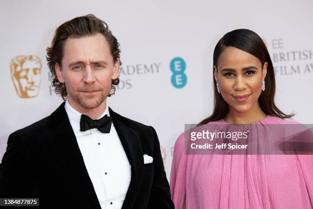 Tom Hiddleston and Zawe Ashton attend the EE British Academy Film Awards 2022 at Royal Albert Hall on March 13, 2022 in London, England.