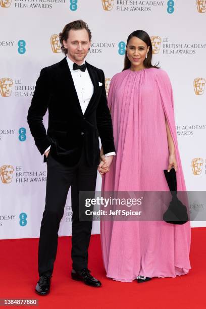 Tom Hiddleston and Zawe Ashton attend the EE British Academy Film Awards 2022 at Royal Albert Hall on March 13, 2022 in London, England.