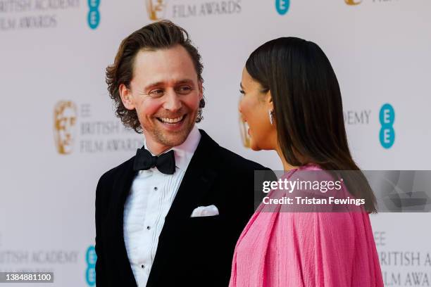 Tom Hiddleston and Zawe Ashton attends the EE British Academy Film Awards 2022 at Royal Albert Hall on March 13, 2022 in London, England.