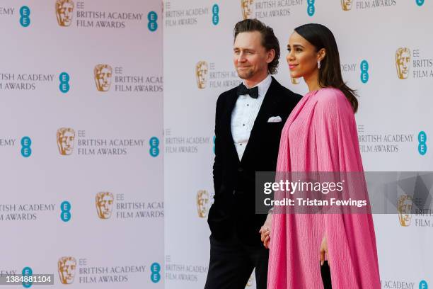 Tom Hiddleston and Zawe Ashton attends the EE British Academy Film Awards 2022 at Royal Albert Hall on March 13, 2022 in London, England.