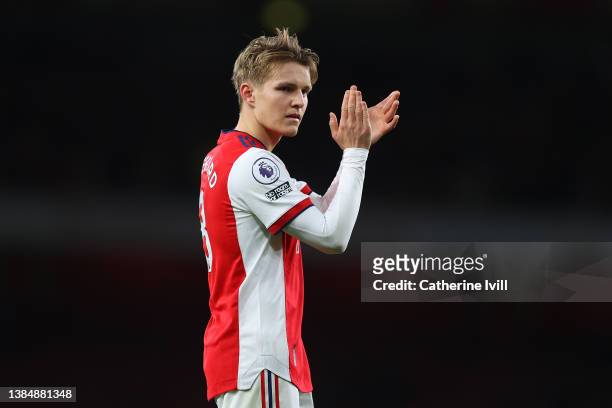 Martin Odegaard of Arsenal celebrates victory following the Premier League match between Arsenal and Leicester City at Emirates Stadium on March 13,...