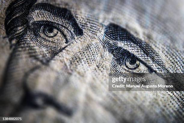 money: close-up of the portrait of alexander hamilton on the us 10 dollar banknote - alexander hamilton bildbanksfoton och bilder